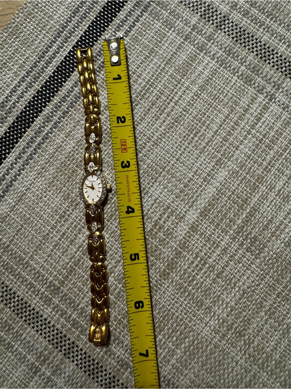 Bulova Women's Gold and White Diamond-Accent Bracelet Watch - Picture 10 of 10